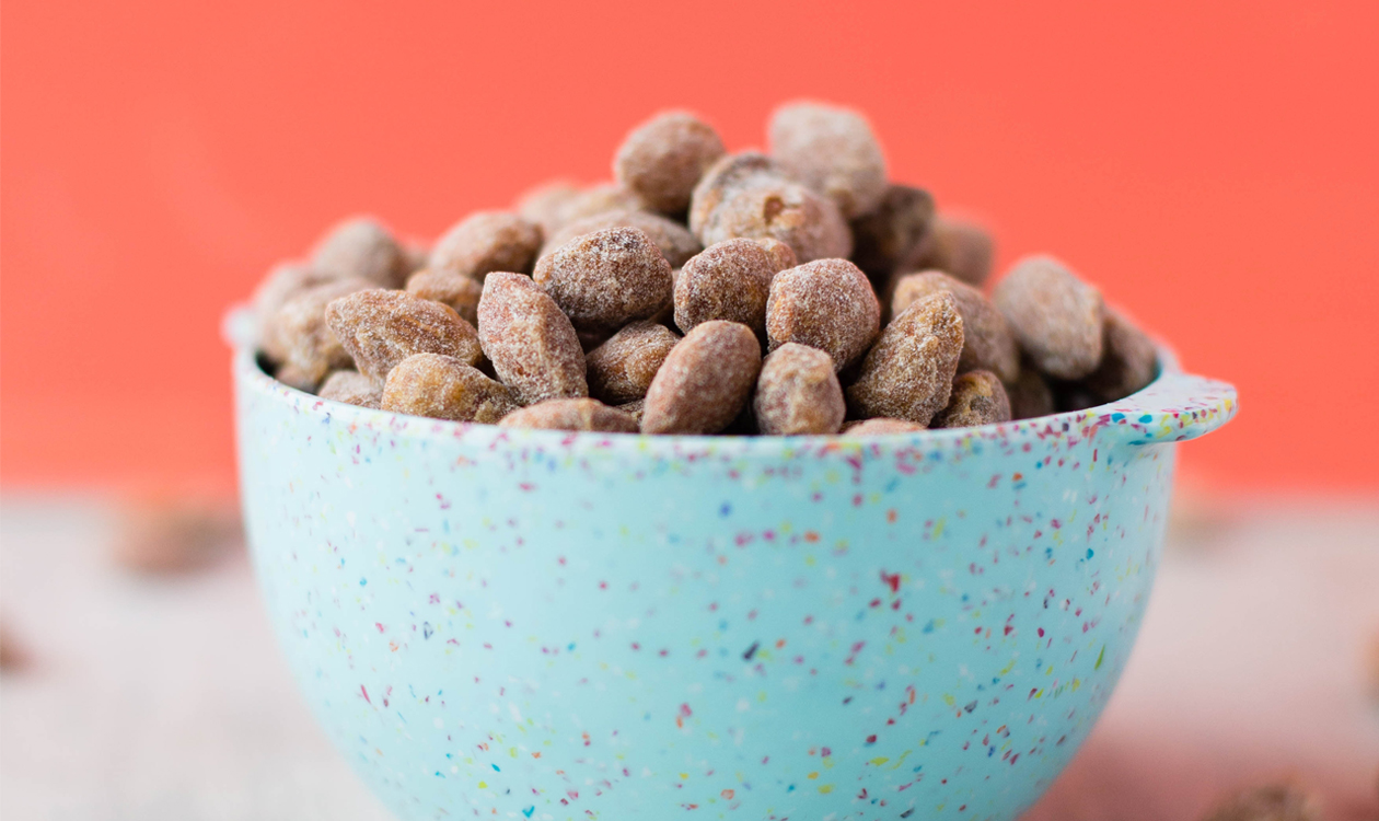 a blue bowl with nuts